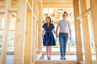 Couple at new construction homesite