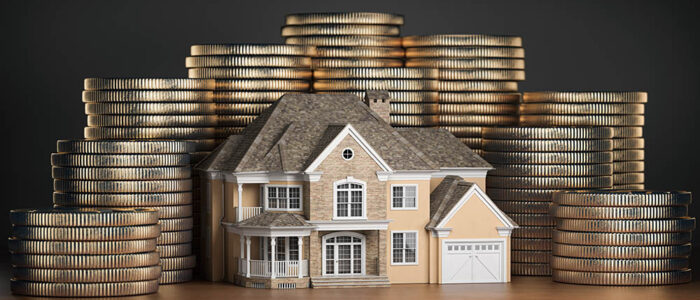model of house with gold coins