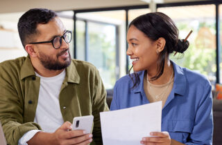 Man and woman with paperwork