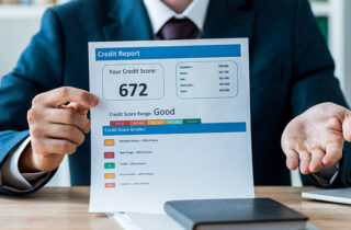 Man holding credit report