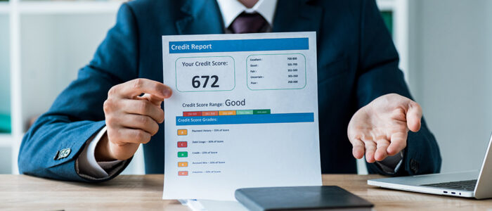 Man holding credit report