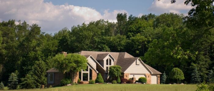House surrounded by bushes and trees