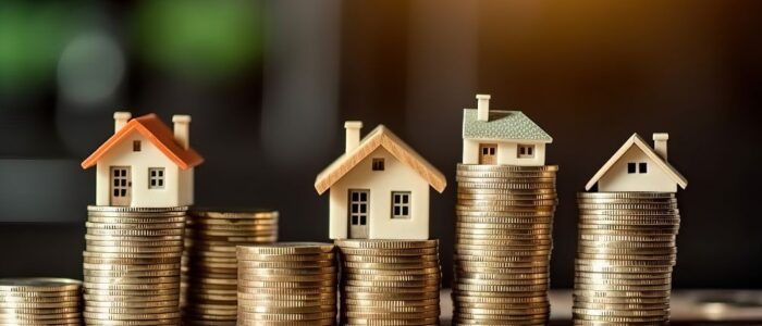 coins and miniature houses