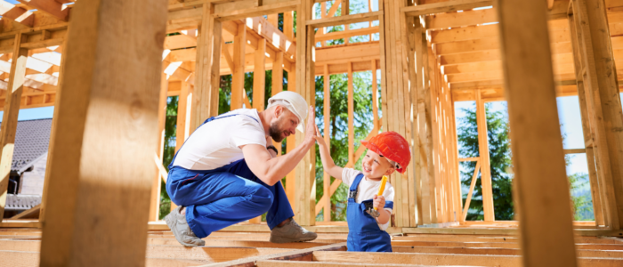 Father and Child Building Wood Frame Together